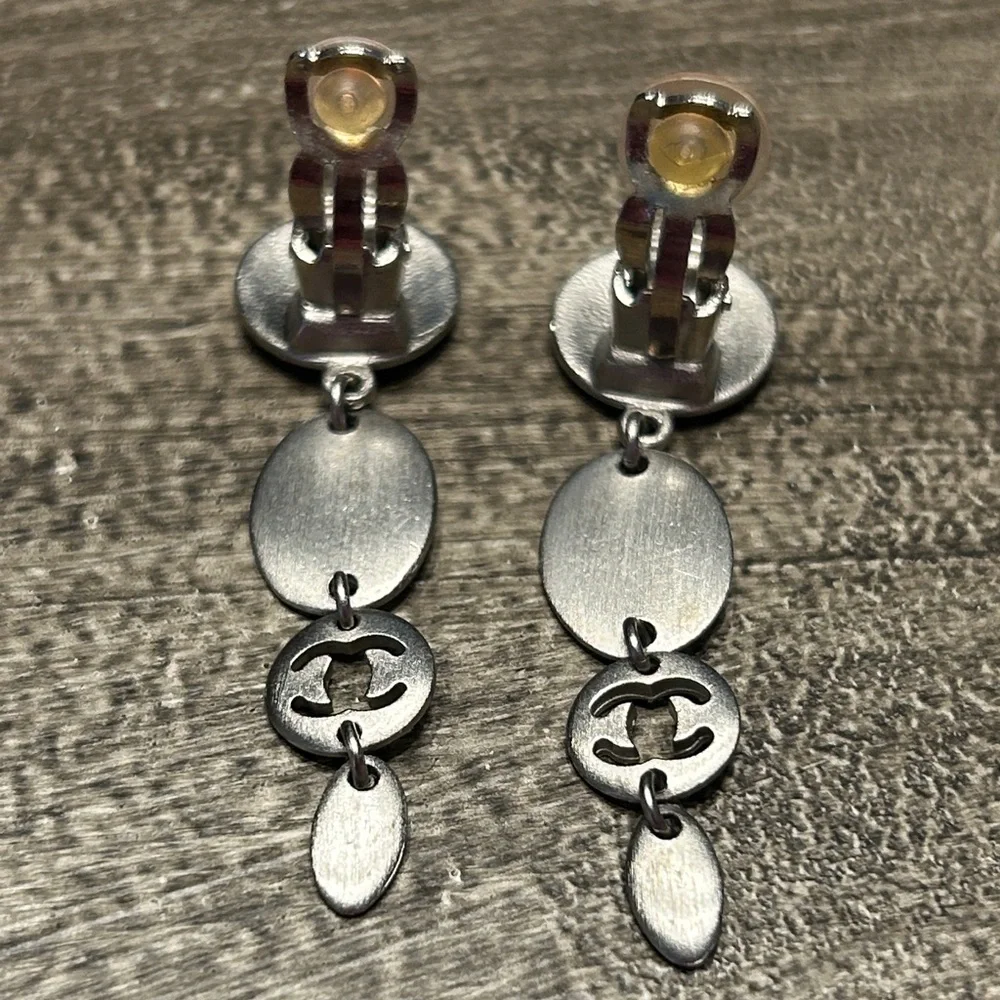 229. CHANEL (Clip)Oval Drop Matte Silver Logo Earrings w/coa - Picture 5 of 8